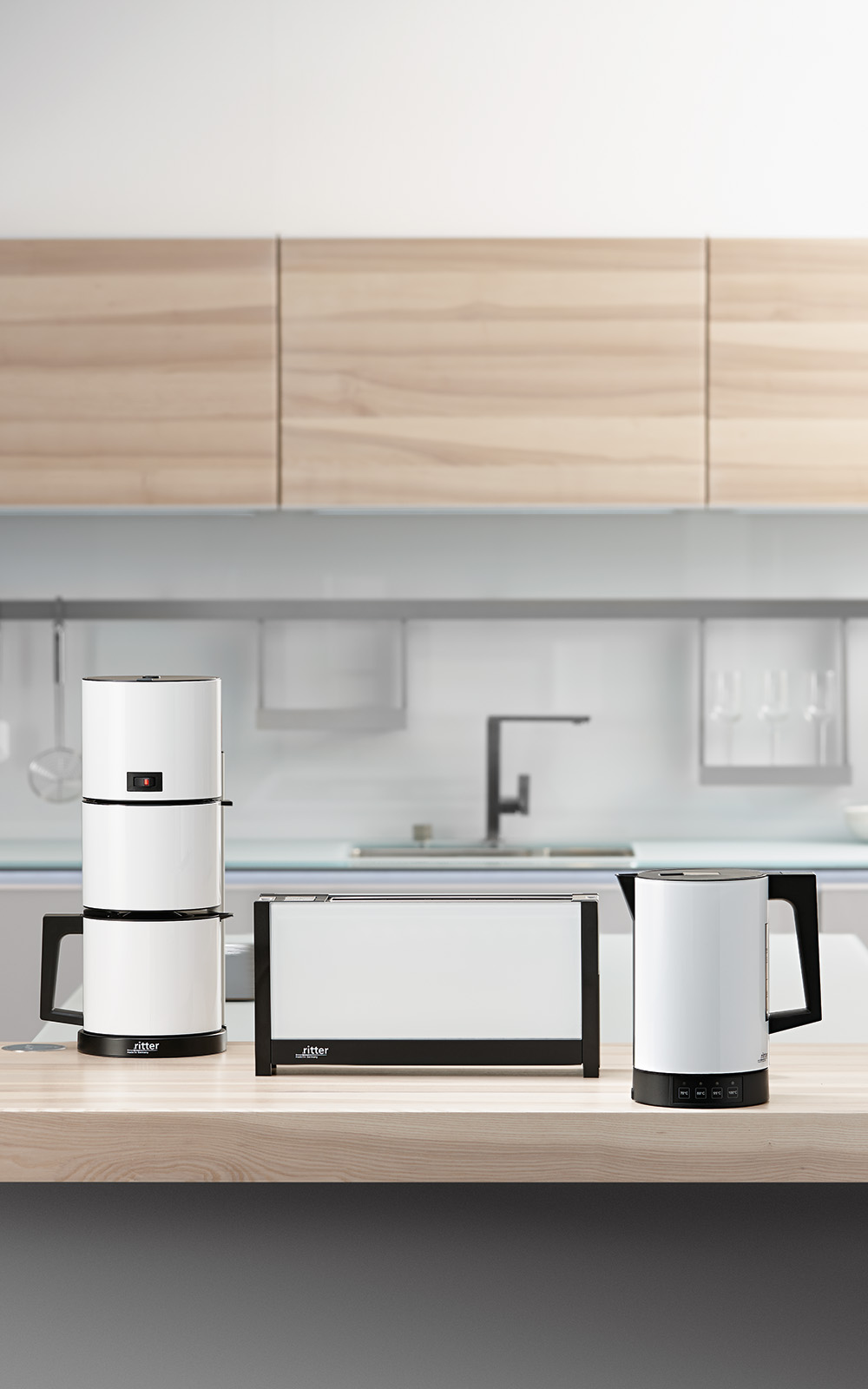 A picture of the white kettle, the white toaster and the white coffee machine standing next to each other in a kitchen. A picture of the white kettle, the white toaster and the white coffee machine standing next to each other in a kitchen.