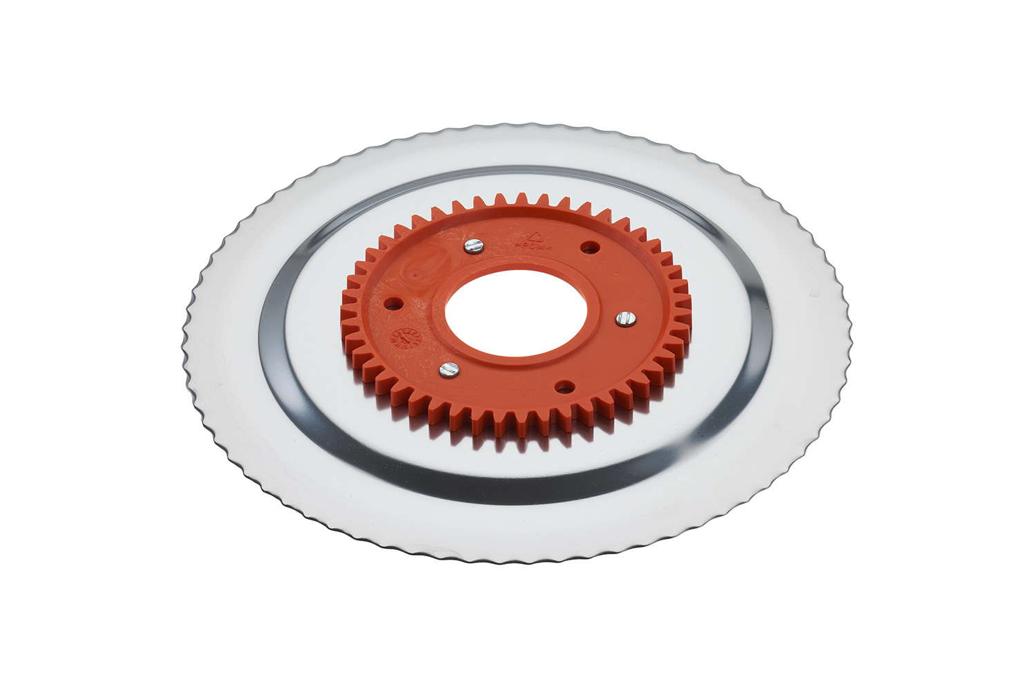 Serrated circular blade with electropolished surface and an orange gear