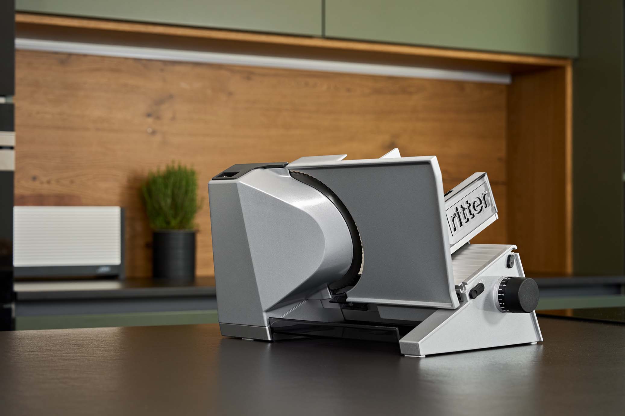 Electric food slicer in modern kitchen