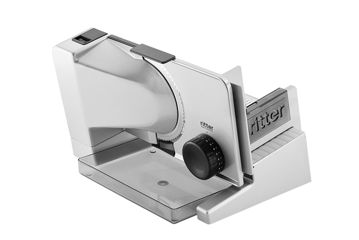 Elektrischer Allesschneider in silber, schräge Ansicht