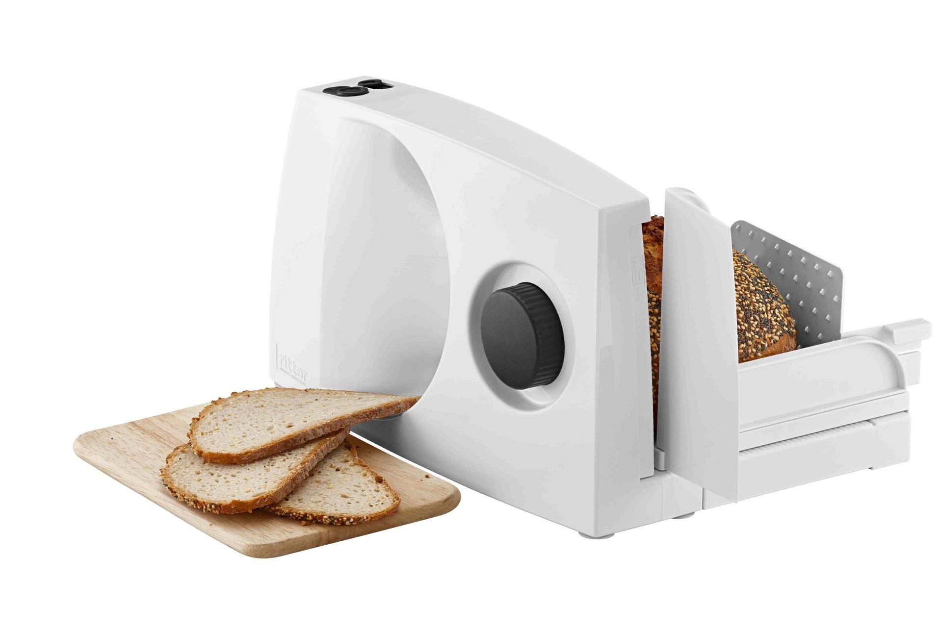 White food slicer made of plastic, side view with sliced bread