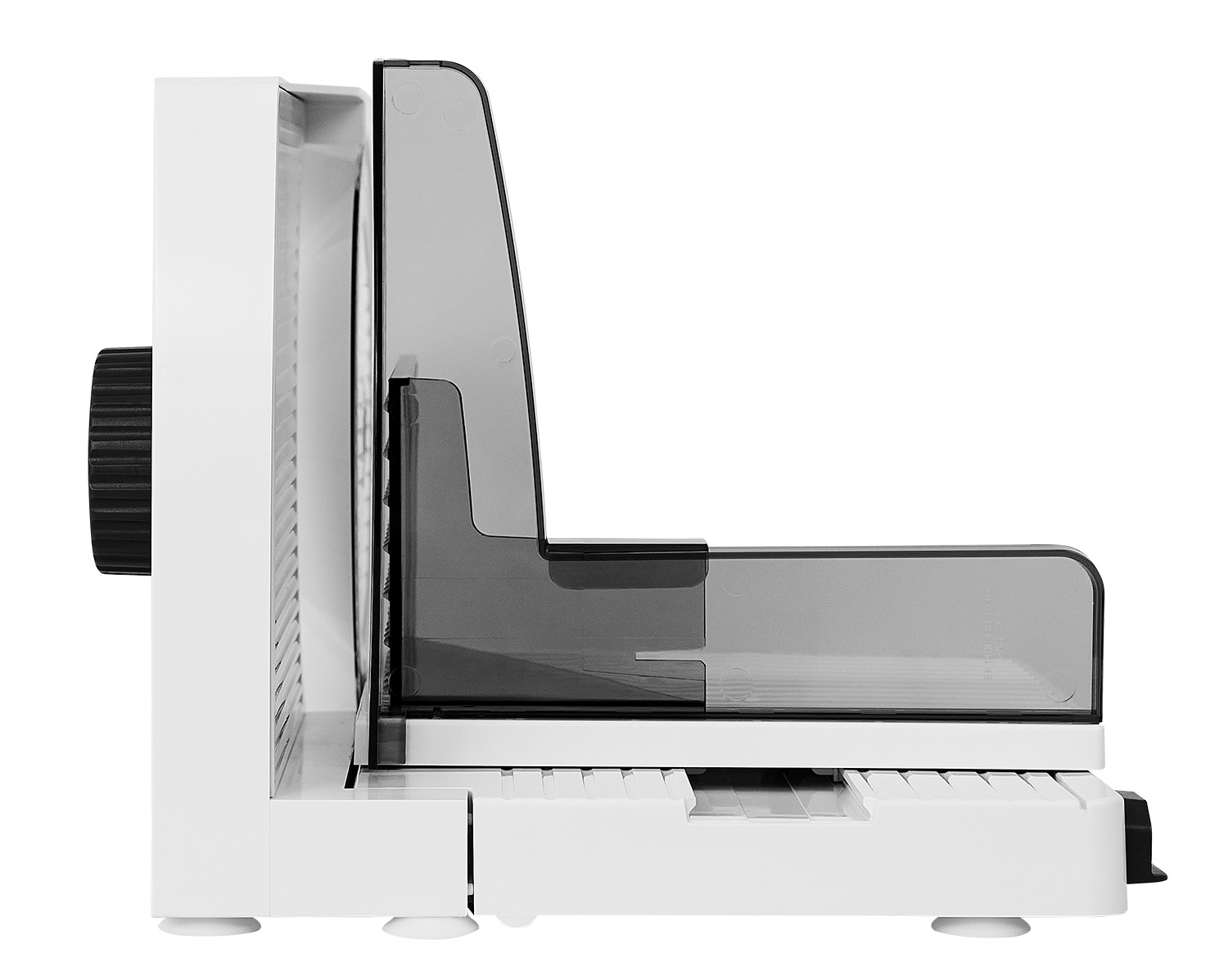 White plastic food slicer; side view