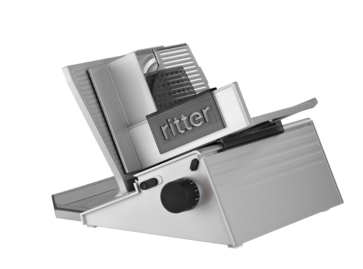 Electric food slicer in silver, angled view