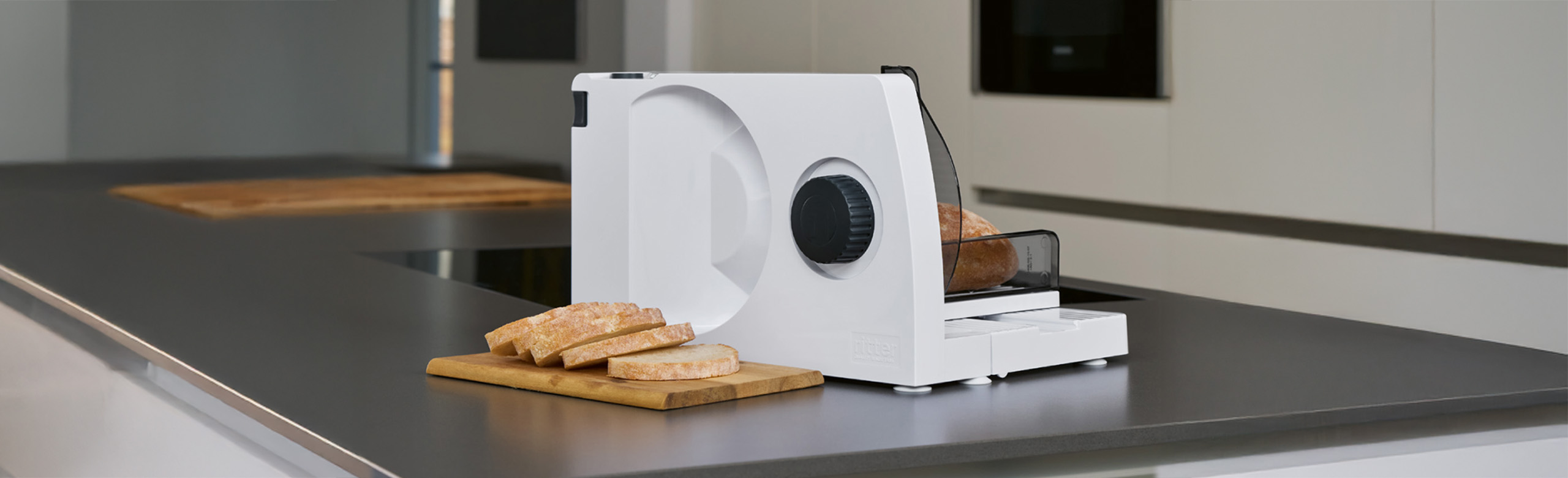 Electrical food slicer in the kitchen